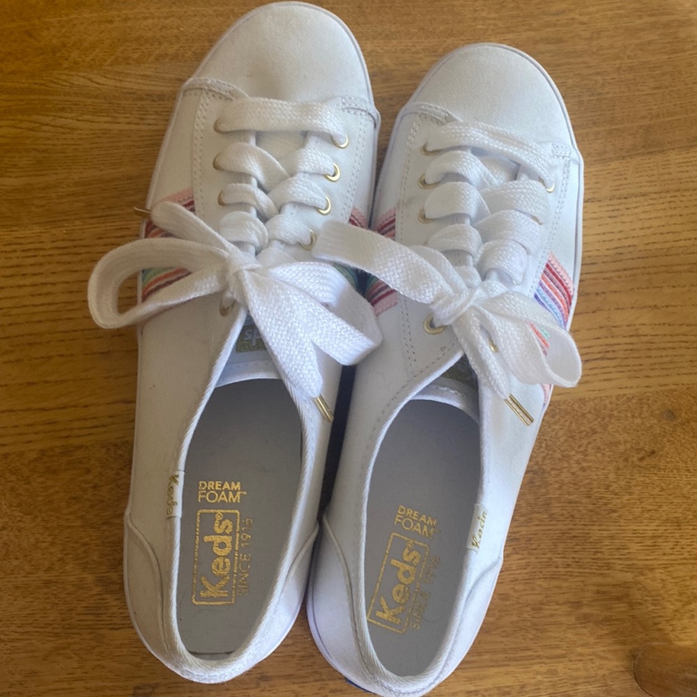 White keds with rainbow sides